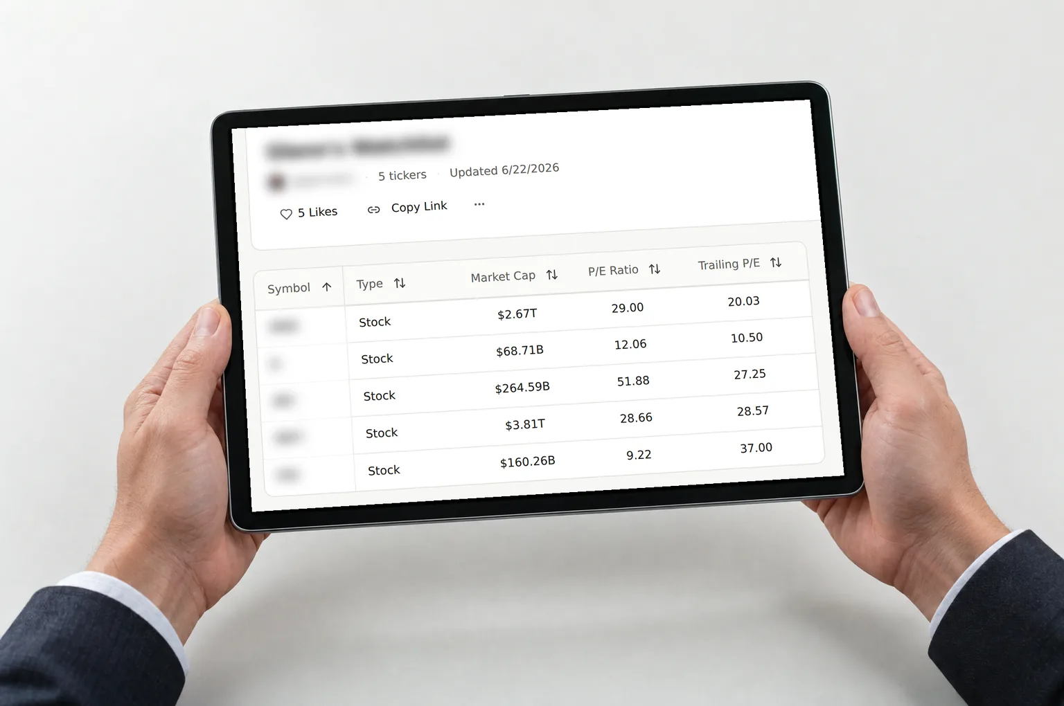 Hands holding a tablet showing a shared five-stock watchlist with market cap and P/E columns; names and symbols are blurred.