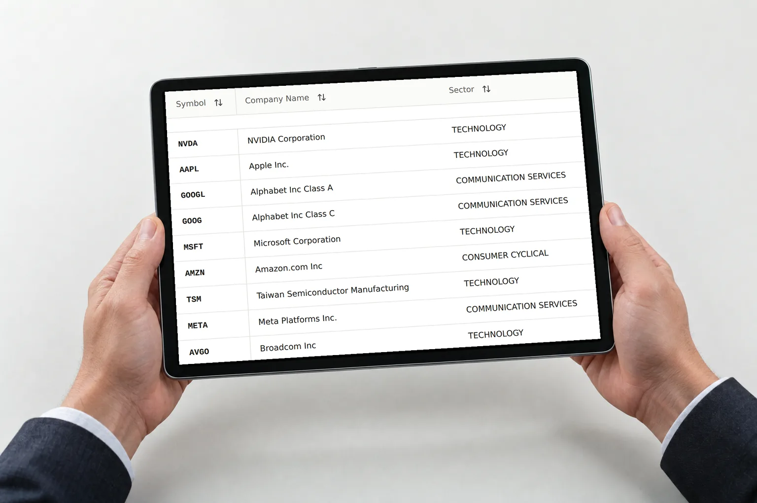 Hands holding a tablet showing Research Terminal rows with stock symbols, company names and sectors